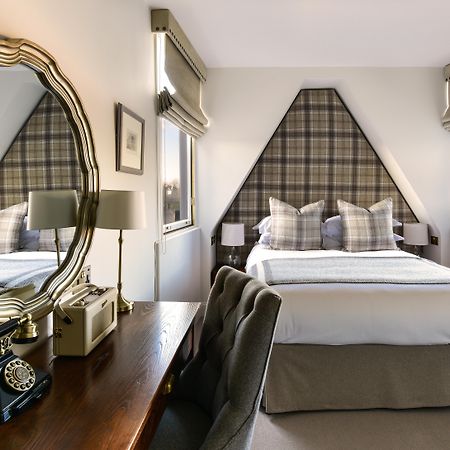 The Roseate Edinburgh - Small Luxury Hotels Of The World Exteriér fotografie A bedroom at the hotel