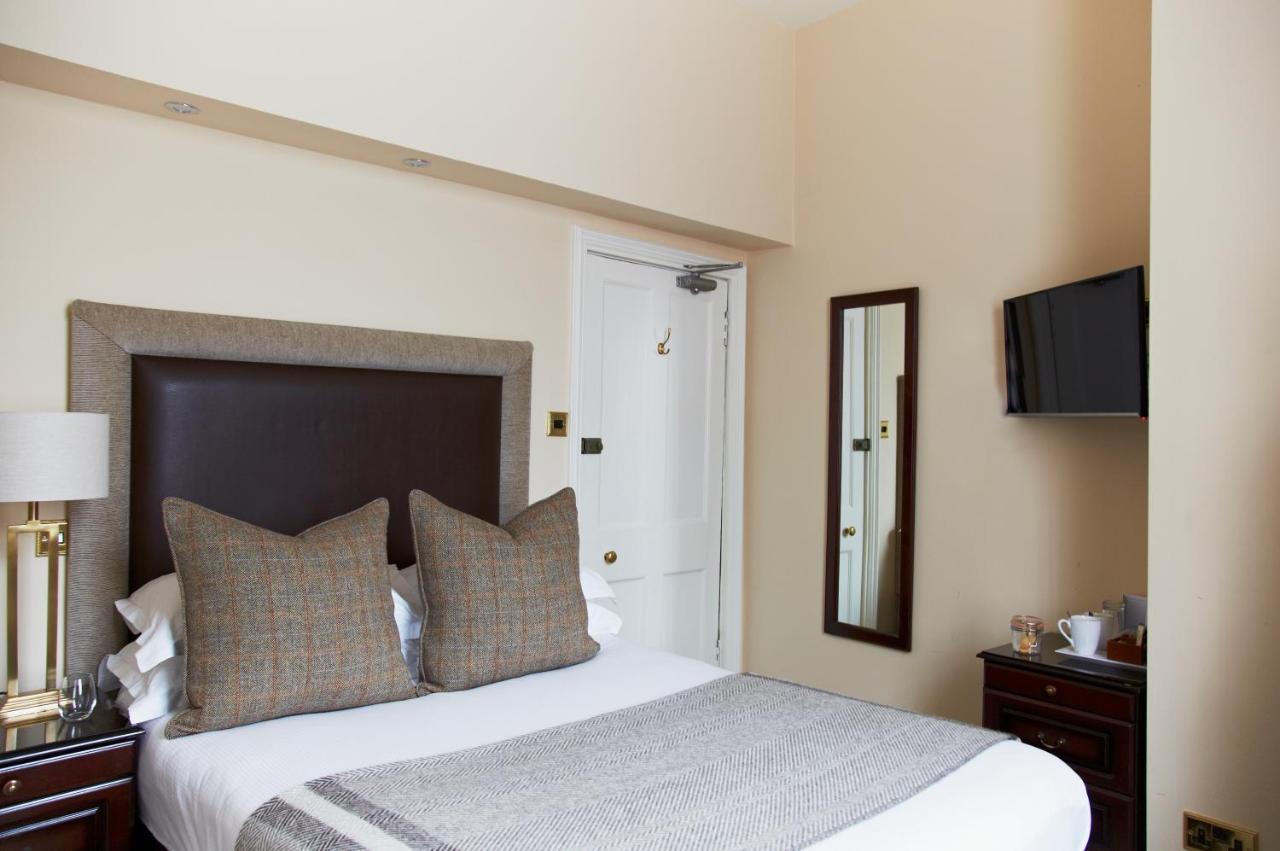 The Roseate Edinburgh - Small Luxury Hotels Of The World Exteriér fotografie A bedroom at the hotel
